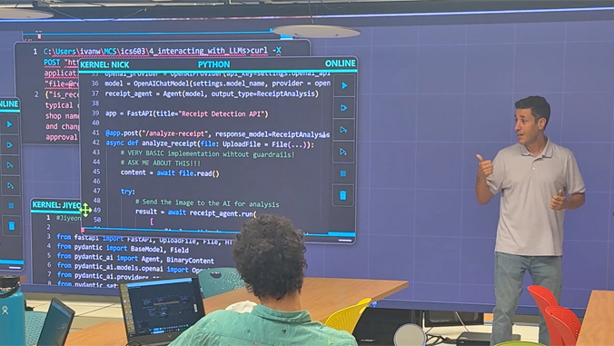 Teaching a class on interacting with large language models, with live code shared across a wall-sized SAGE display